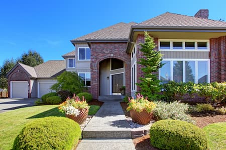 How Professional House Washing Can Help Sell Your Home Faster